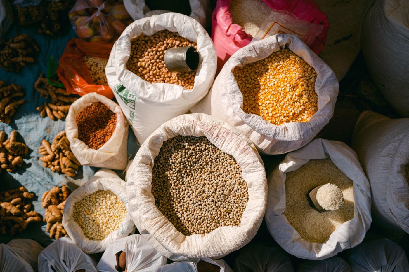 Sacks of grains at a market, illustrating the food supplies that sustain a city.