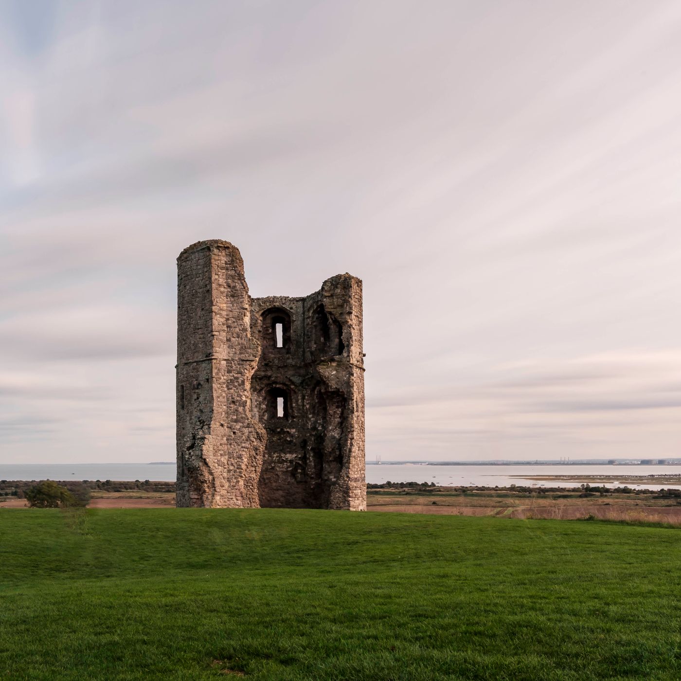 Broken stone towers at Hadleigh Castle, a thematic photograph about ruined power and memory.